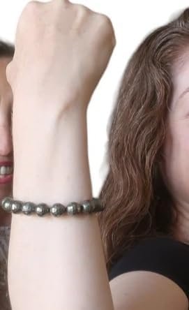 Model wearing the Divinity Healing Crystals Pyrite Money Magnet bracelet for confidence and abundance.
